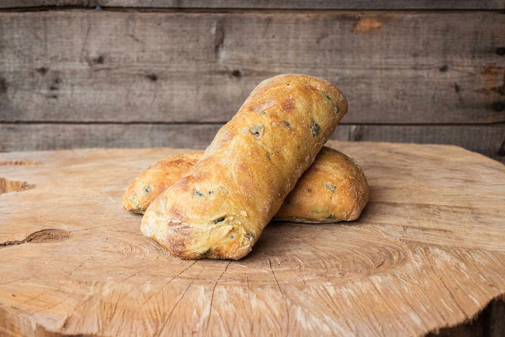 Petit pain ciabatta à l'huile d'olive très moelleux idéal pour préparer de délicieux sandwich, version nature ou aux olives.